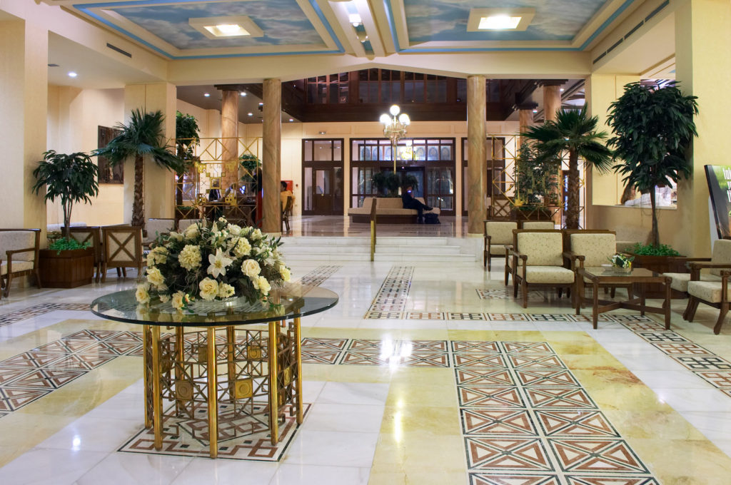 large space with marble tiles and furniture