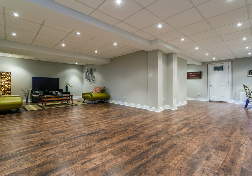 clean large room space with wood tiles