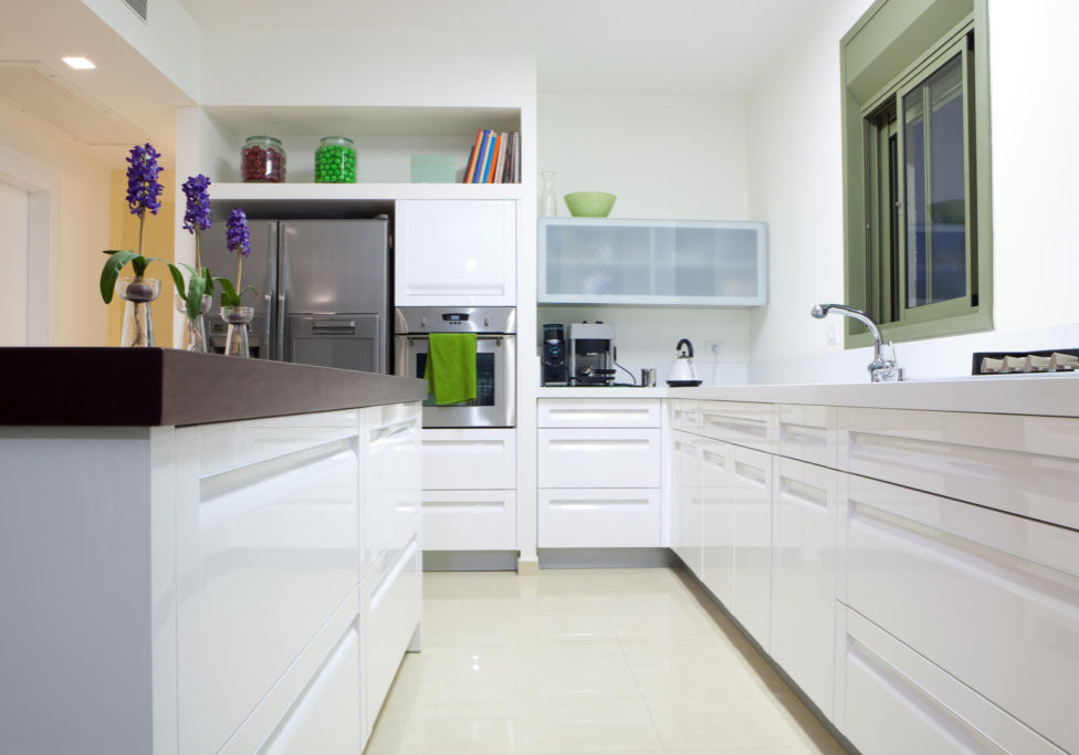 a minimalist clean white kitchen